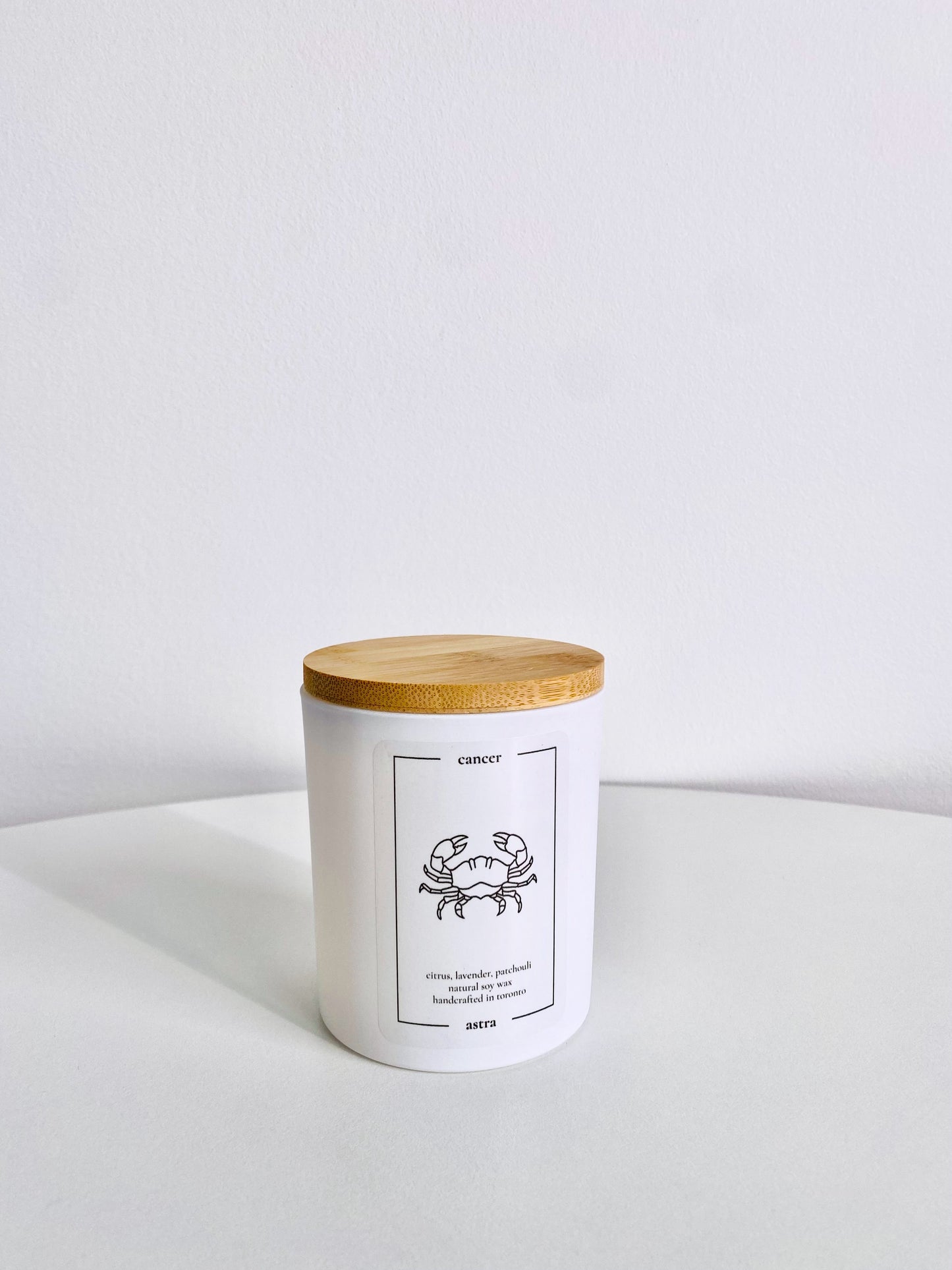 A Cancer candle, depicting a crab, scented citrus, lavender and patchouli