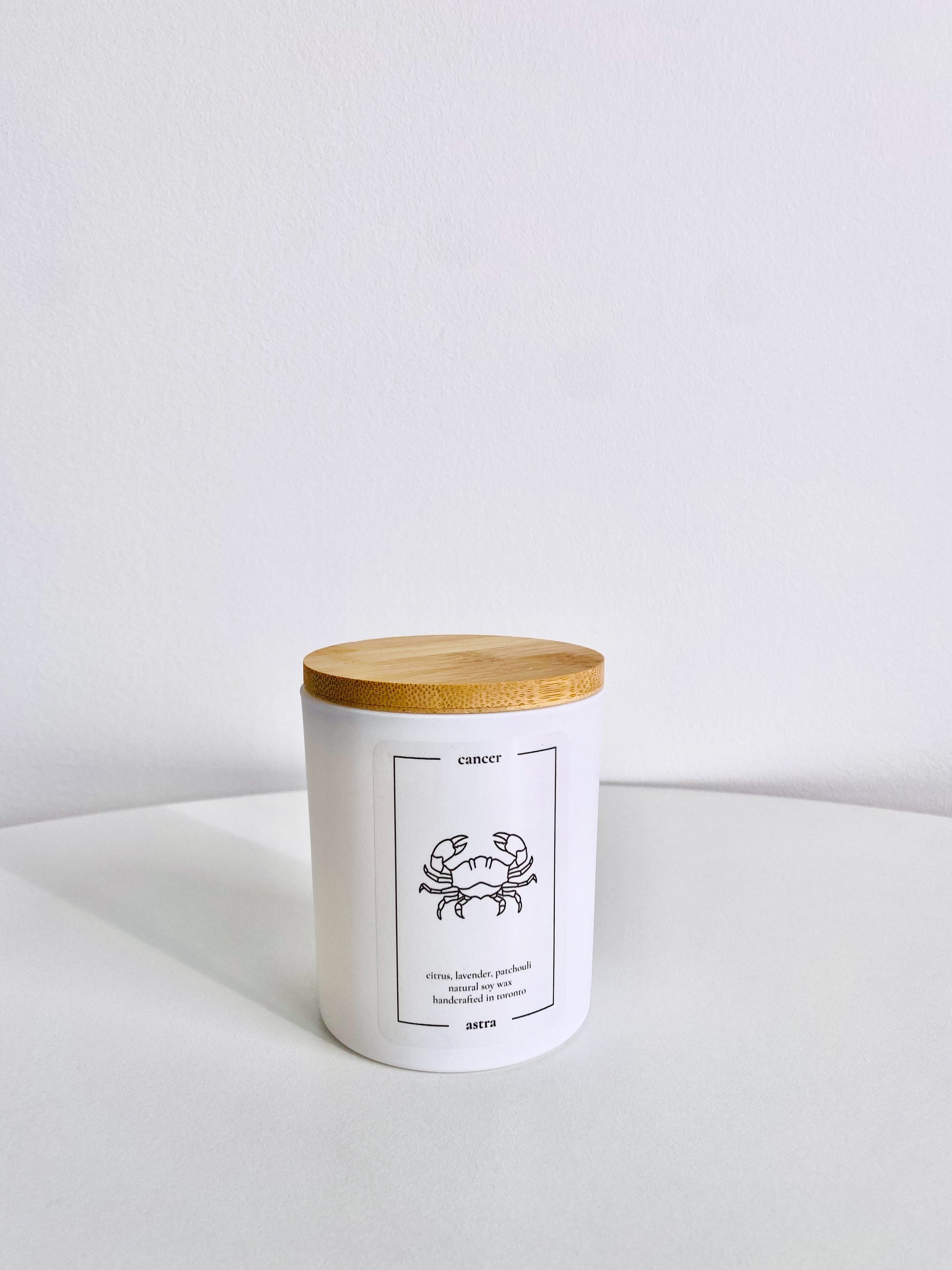 A Cancer candle, depicting a crab, scented citrus, lavender and patchouli